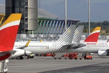 Noticias de aerolíneas. Noticias de compañías aéreas. Noticias de turismo. Aviones de Iberia y Vueling