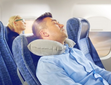 durmiendo en un avión
